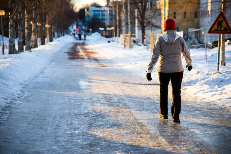 female-wearing-winter-clothing-walking-on-a-snowy-2025-02-08-01-05-01-utc (1)