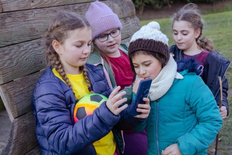 four-teenage-girls-play-outdoors-early-spring-in-2025-01-09-02-09-56-utc (1)