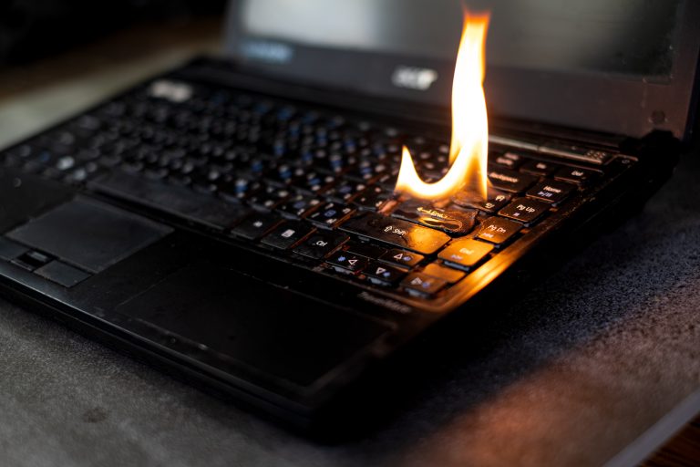 the-computer-laptop-is-burning-with-flames-2025-05-16-18-52-28-utc (1)