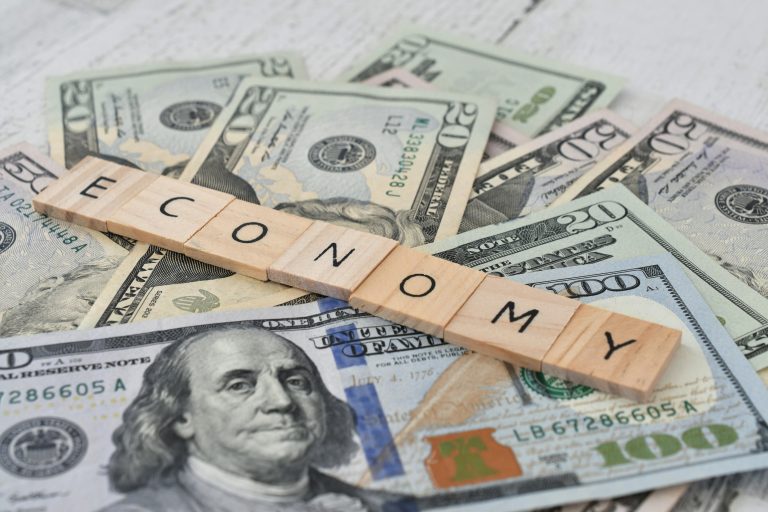 the-word-economy-spelled-out-in-wooden-letter-tile-2025-03-11-18-26-47-utc (1)